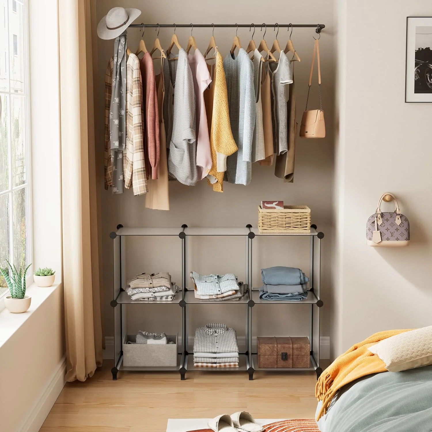A HOMIDEC clothes rack and cube storage forming an open wardrobe in a warm bedroom